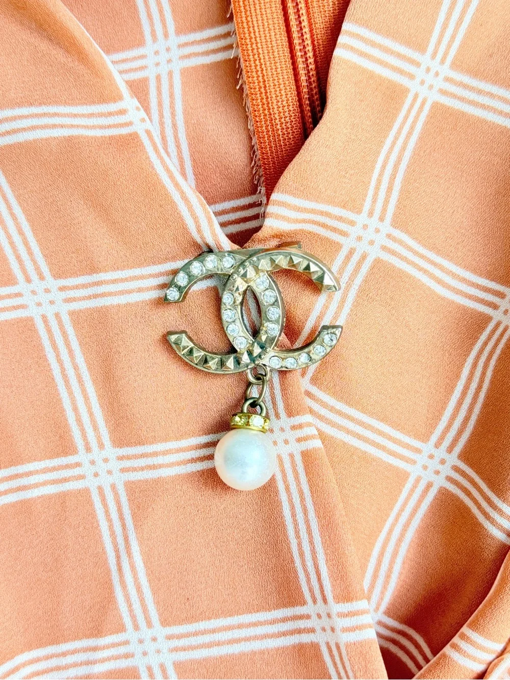 CHANEL Peach Plaid Mini Dress with Signature Brooch